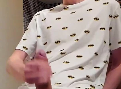 Sweet load of cum flows from this cute guy's big cock