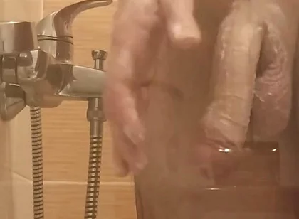 A Young Guy Washes in the Shower and Dreams of Someone Being Next to Him