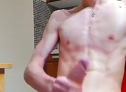 A young beautiful gay twink fucks a vibrator